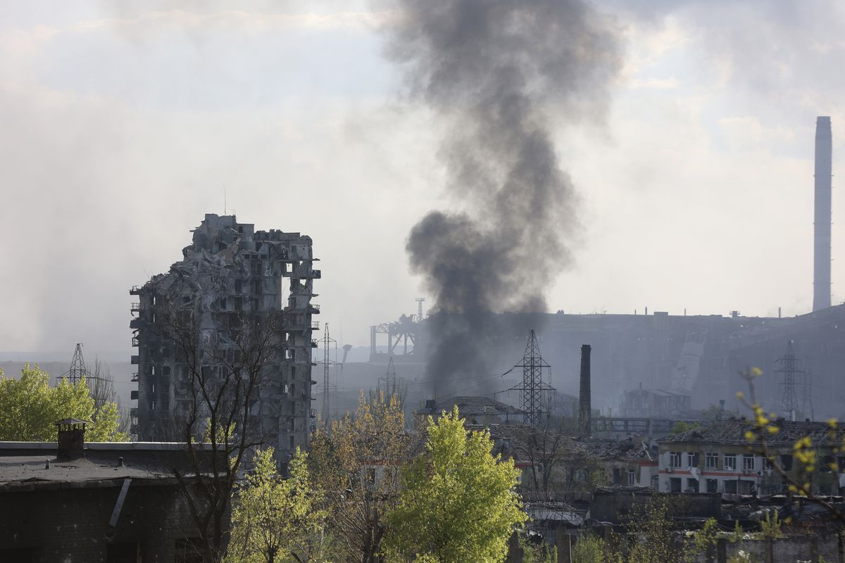 FILE - Smoke rises from the Azovstal steel mill in Mariupol, in territory under the government of the Donetsk People's Republic, eastern Ukraine, May 4, 2022.  (Alexei Alexandrov)
