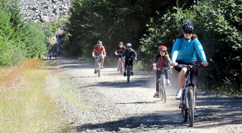 A long, healthy ride on the gentle grade of the Iron Horse Trail makes a great family vacation. (Gene Bisbee)