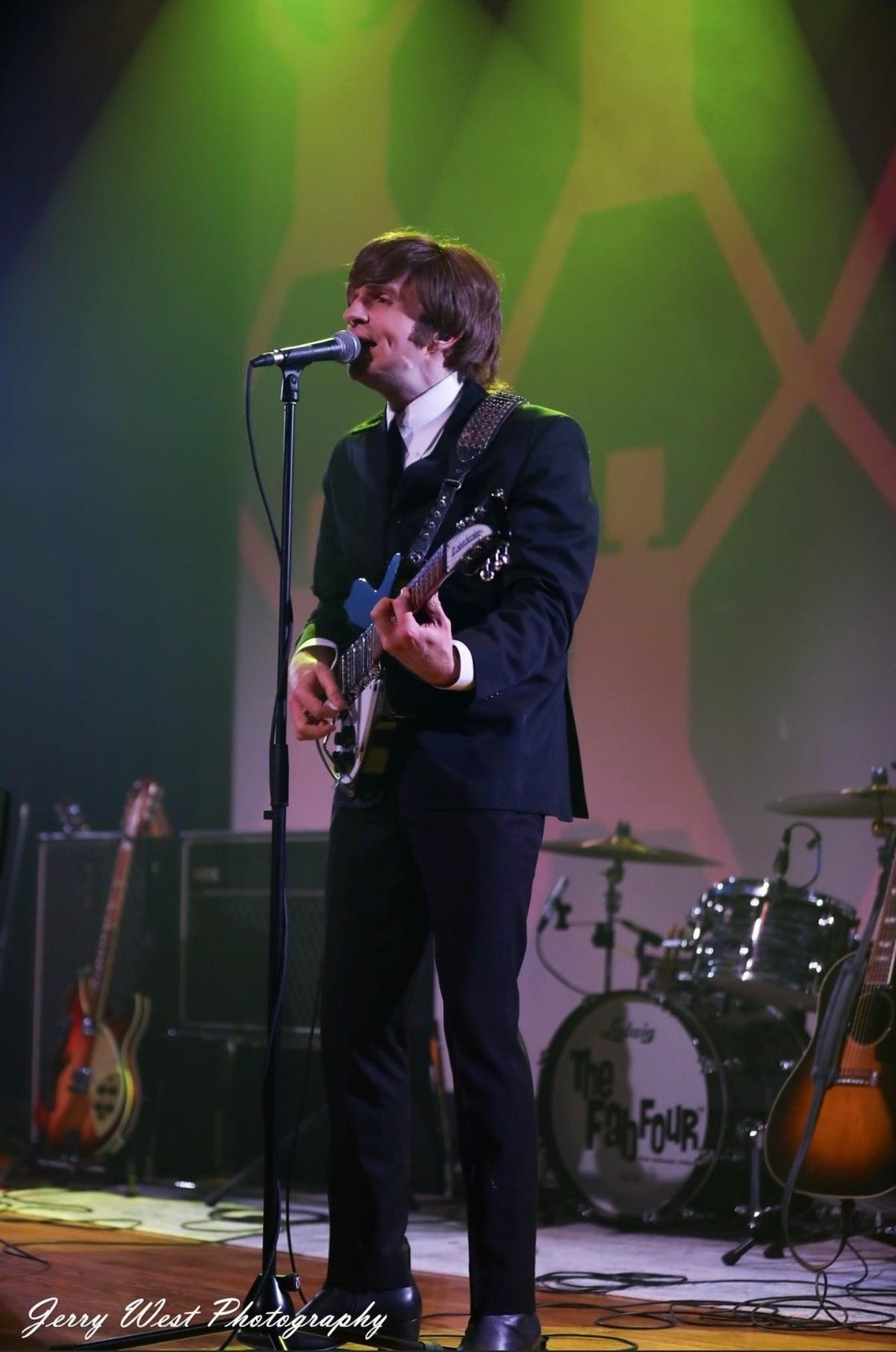 Jonathan Fickes was raised in Moses Lake. He is living his dream performing as a John Lennon cast member with the Fab Four Beatles tribute band.  (Courtesy of Jerry West Photography)