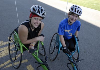 CV freshmen Amber Weber, left, and Emily Owens are two of the Bears’ wheelchair cross country athletes. (J. BART RAYNIAK / The Spokesman-Review)