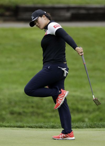 Angel Yin reacts to her putt on the 12th green during the first round of the Indy Women in Tech Championship golf tournament, Thursday, Aug. 16, 2018, Indianapolis. (Darron Cummings / Associated Press)