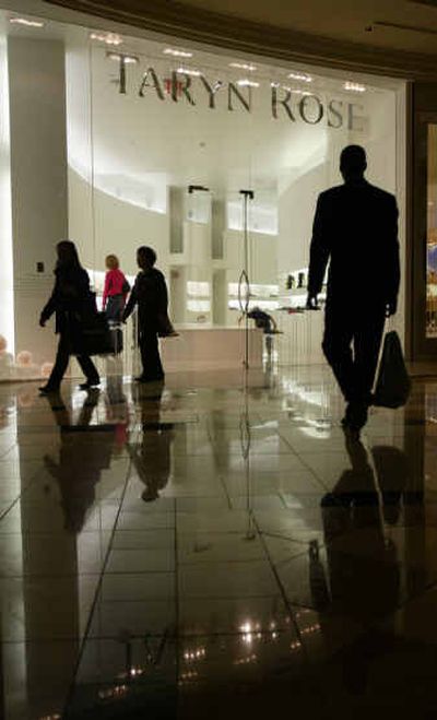 
The Forum Shops at Caesars Palace in Las Vegas, are crowded with Christmas shoppers earlier this month. High-end luxury shopping has become a tourist attraction for visits to Las Vegas, especially during the holidays. 
 (File/Associated Press / The Spokesman-Review)
