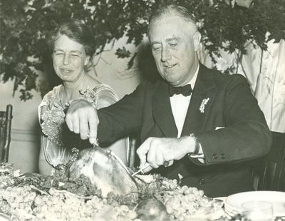First lady Eleanor Roosevelt watches as President Franklin D. Roosevelt carves a turkey on Nov. 29, 1935, at Warm Springs, Ga.  (Franklin D. Roosevelt Presidential Library & Museum)