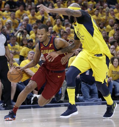In this April 27, 2018, file photo, Cleveland Cavaliers’ Rodney Hood, left, heads to the basket past Indiana Pacers’ Trevor Booker during the first half of Game 6 of a first-round NBA basketball playoff series, in Indianapolis. A person familiar with the situation says the Cavaliers will not fine or suspend forward Rodney Hood for refusing to enter Game 4 against Toronto. The Athletic reported that Hood angered his teammates and others in the organization when he declined coach Tyronn Lues request to replace LeBron James with 7:38 left and the Cavs leading by 30. Hood spoke to team officials about the incident Tuesday, May 8, 2018, and will not be disciplined, said the person who spoke to the Associated Press on condition of anonymity because of sensitivity. (Darron Cummings / Associated Press)