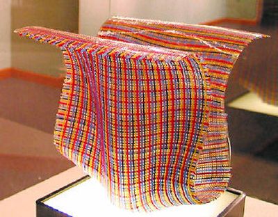 
Among the 32 artworks in the Chase Gallery's new exhibit is Louis Telford's woven fused glass piece.
 (Julianne Crane / The Spokesman-Review)