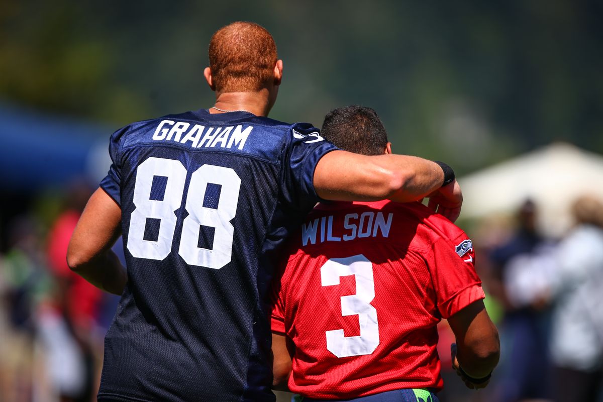 It will take more than big tight end Jimmy Graham to make sure Seahawks quarterback Russell Wilson is protected. (Associated Press)