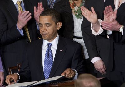 President Barack Obama is applauded by members of Congress, and others, after signing an Executive Order on stem cells and a Presidential Memorandum on scientific integrity Monday in the East Room of the White House in Washington.  (Associated Press / The Spokesman-Review)