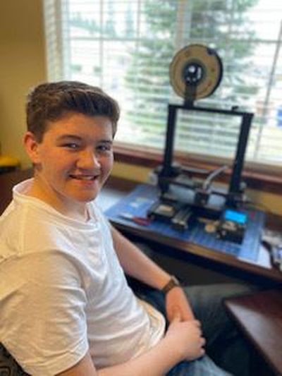 Connor Duncan is printing face shields on his 3-D printer for his mother, Christina, and her colleagues to use as they provides in-home care for people. (Courtesy Connor Duncan)