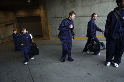 Here's a familiar scene for the Gonzaga players as they carry their bags away from KeyArena earlier this month after their game against Oklahoma State.
(Brian Plonka / The Spokesman-Review)