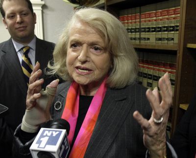 Edith Windsor, center, is interviewed at the offices of the New York Civil Liberties Union, in New York, Thursday, Oct. 18, 2012. A federal appeals court in Manhattan has become the second in the nation to strike down the Defense of Marriage Act as unconstitutional. The ruling came in a case brought by Windsor. She sued the government in November 2010 because she was told to pay $363,053 in federal estate tax after her partner of 44 years died in 2009. (Richard Drew / Associated Press)