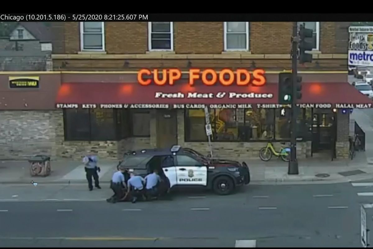 In this image from surveillance video, Minneapolis police Officers from left, Tou Thao, Derek Chauvin, J. Alexander Kueng and Thomas Lane are seen attempting to take George Floyd into custody in Minneapolis, Minn on May 25, 2020. Prosecutors played videos from the scene of Floyd