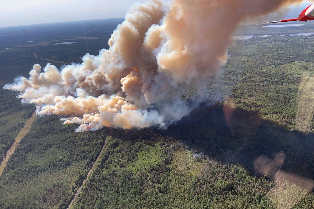 This Aug. 15, 2021, photo provided by U.S. Forest Service-Superior National Forest shows a rapidly growing wildfire in northeastern Minnesota that has prompted some evacuations, the U.S. Forest Service said Monday, Aug. 16, 2021. The fire was spotted around 3 p.m. Sunday near Greenwood Lake, about 15 miles southwest of Isabella, in the Superior National Forest.  (Nick Petrack)