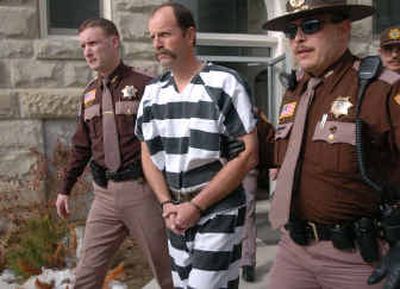 
Kelly A. Frank, 43, is led from the Teton County Courthouse in Choteau, Mont., Tuesday after pleading not guilty to plotting to kidnap David Letterman's 16-month-old son and his nanny and hold them for a $5 million ransom. 
 (Associated Press / The Spokesman-Review)