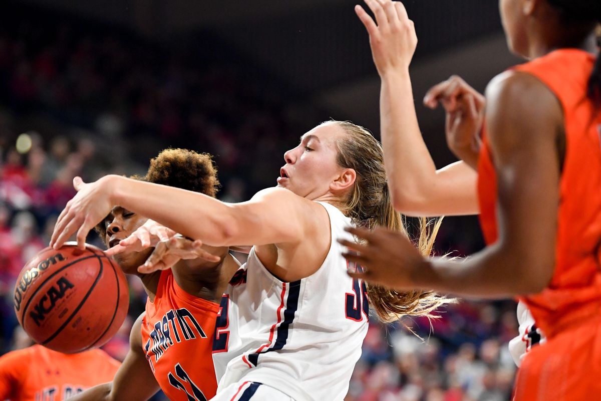 Gonzaga Bulldogs guard Jill Townsend (32) vies for a rebound against UT Martin Skyhawks forward Dasia Young (11) during the first half of a college basketball game on Thursday, November 14, 2019, at McCarthey Athletic Center in Spokane, Wash. (Tyler Tjomsland / The Spokesman-Review)