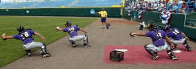 
Louisiana State catchers practice for the College World Series Thursday in Rosenblatt Stadium in Omaha, Neb. 
 (Associated Press / The Spokesman-Review)