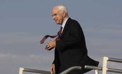 
Republican presidential candidate Sen. John McCain, R-Ariz., walks from his campaign charter jet in Dallas Monday. Associated Press
 (Associated Press / The Spokesman-Review)