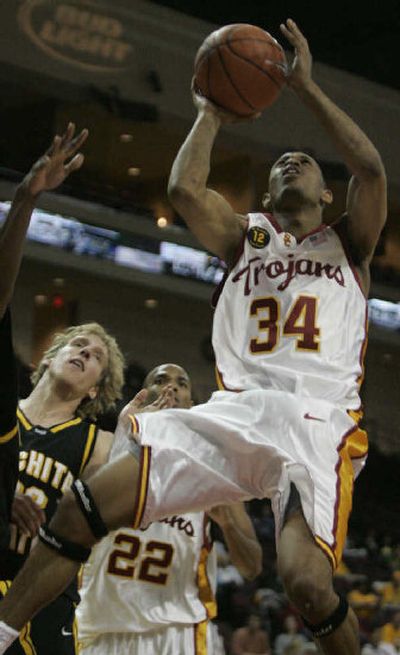 
USC's Gabe Pruitt beats Wichita State's Kyle Wilson to the basket on Saturday. 
 (Associated Press / The Spokesman-Review)