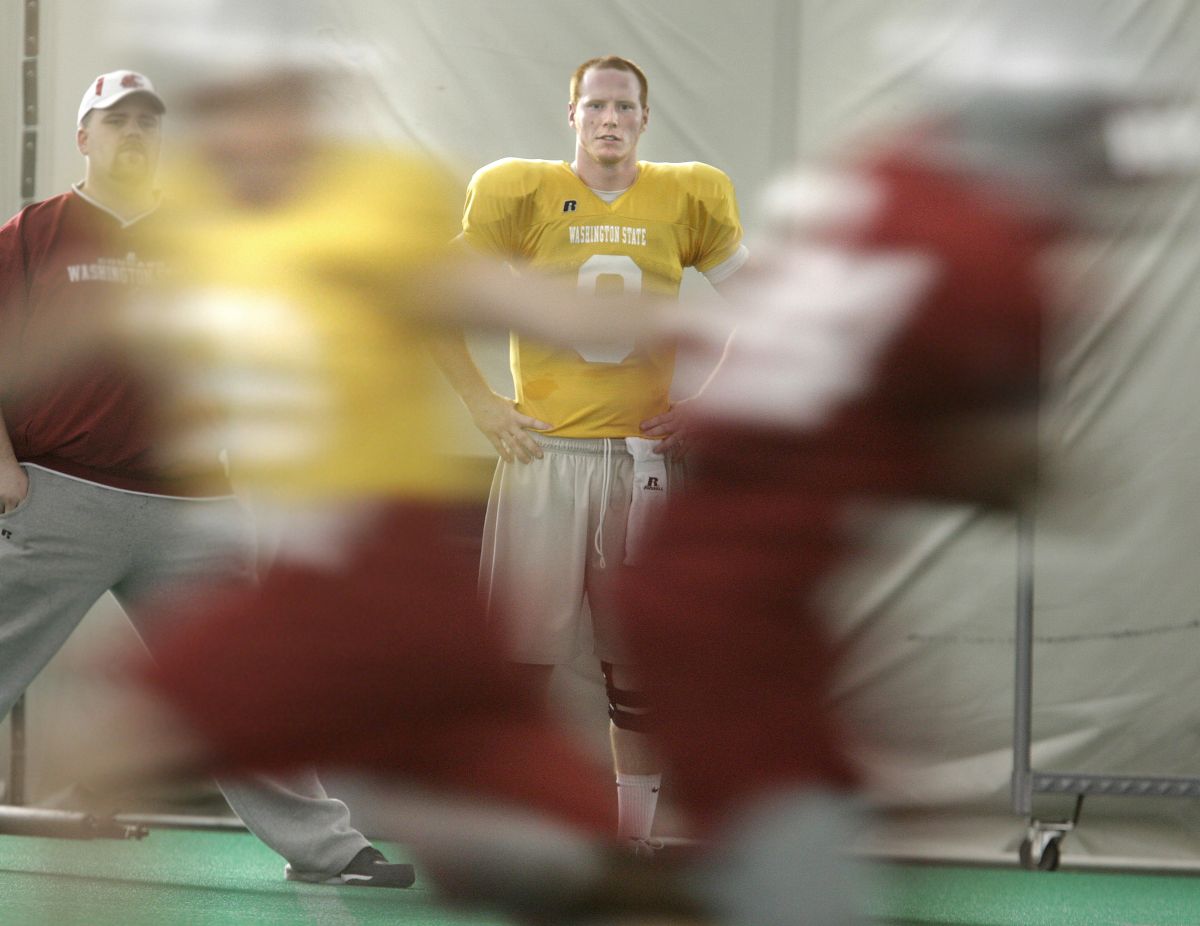 Marshall Lobbestael watches as fellow WSU quarterback Kevin Lopina runs the team during practice earlier this week. Special to  (Tyler Tjomsland Special to / The Spokesman-Review)