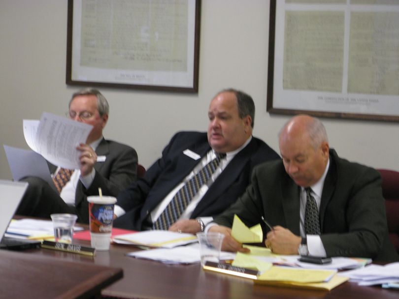 Senate Majority Leader Bart Davis, R-Idaho Falls, proposes financial disclosure legislation. On the left is Senate Assistant Majority Leader Joe Stegner, R-Lewiston, and on the right, Senate President Pro-Tem Bob Geddes, R-Soda Springs. (Betsy Russell / The Spokesman-Review)