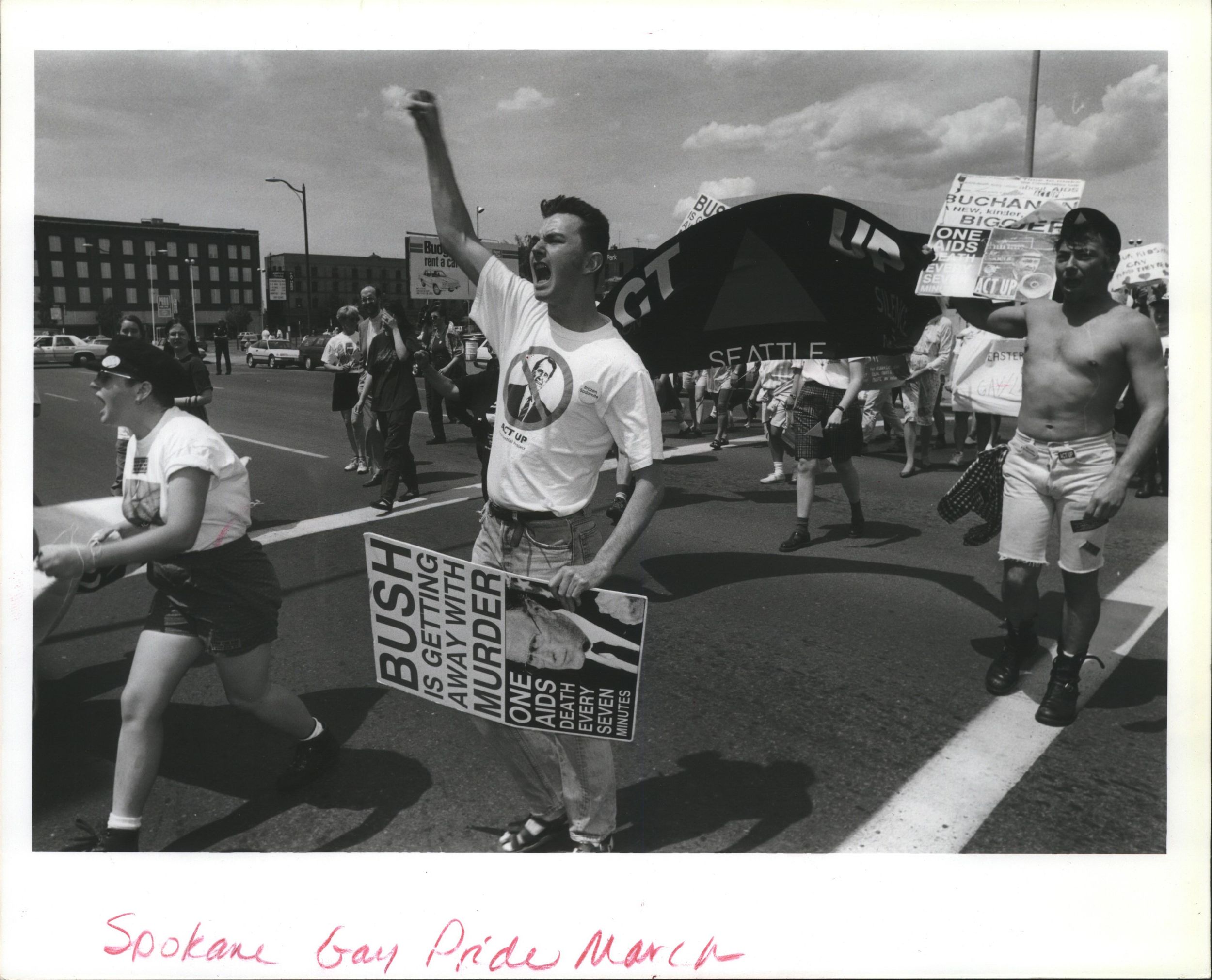 Marchers move past the corner of Bernard and Main during Sunday afternoon's gay pride demonstration. (Dan Pelle / The Spokesman-Review)