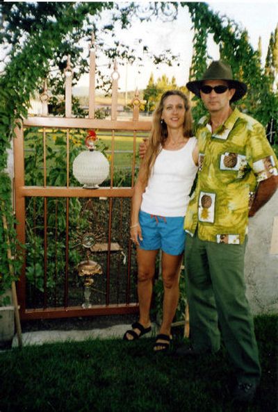 
Luis and Tammy Santana stand in front of one of the three garden gates they designed and crafted for their Newman Lake home
 (Photo courtesy of Luis and Tammy Santana / The Spokesman-Review)