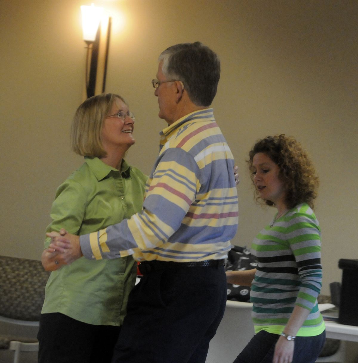 bartr@spokesman.com Dance instructor Melissa Finke watches as Bruce and Sheila Bell of Liberty Lake, learn to ballroom dance during Spokane Parks and Recreation dance lessons at CenterPlace,  April 12. “Come back in six weeks,” Bruce Bell commented, “we’ll be tearing it up.” (J. BART RAYNIAK)