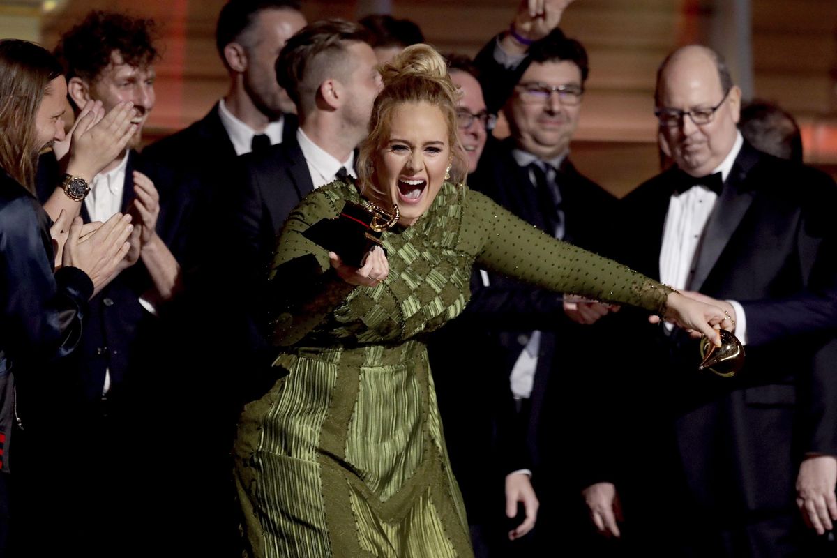 Adele accepts the award for album of the year for "25" at the 59th annual Grammy Awards on Sunday, Feb. 12, 2017, in Los Angeles. (Matt Sayles / Invision/Associated Press)