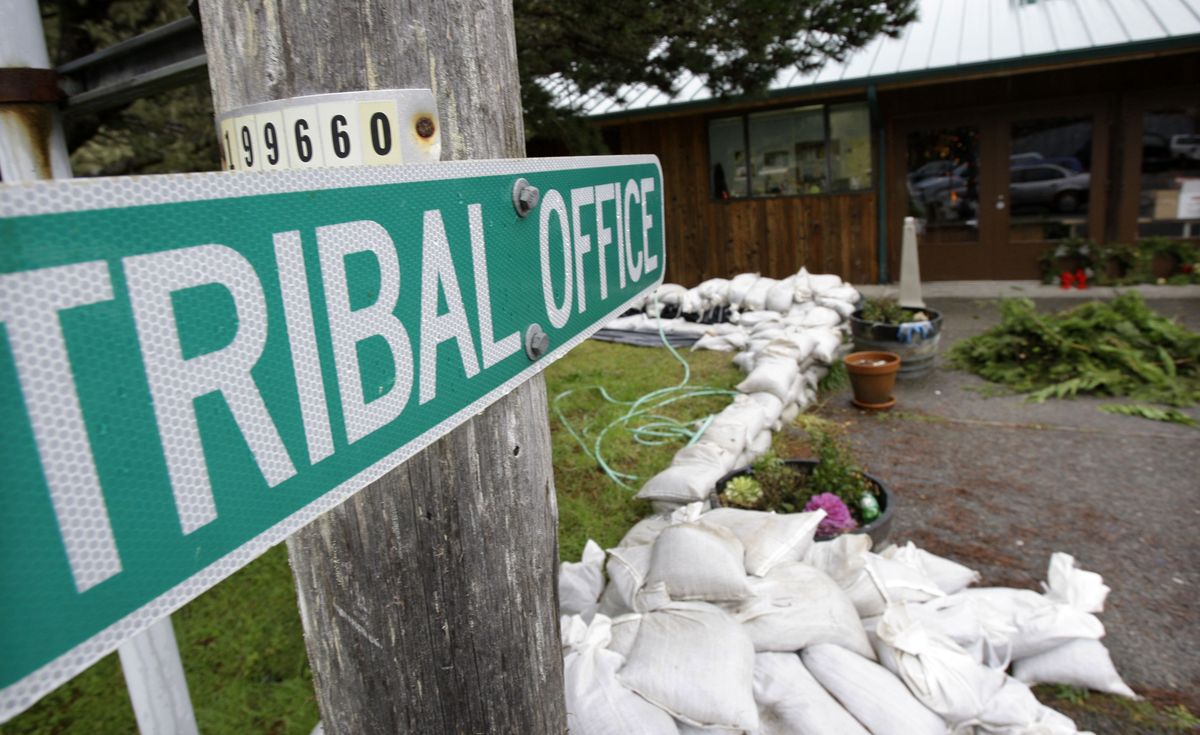Sandbags surround the tribal center on the Hoh Indian Reservation on Dec. 9.  Plans are being made to relocate the entire village to higher ground. Associated Press photos (Associated Press photos / The Spokesman-Review)