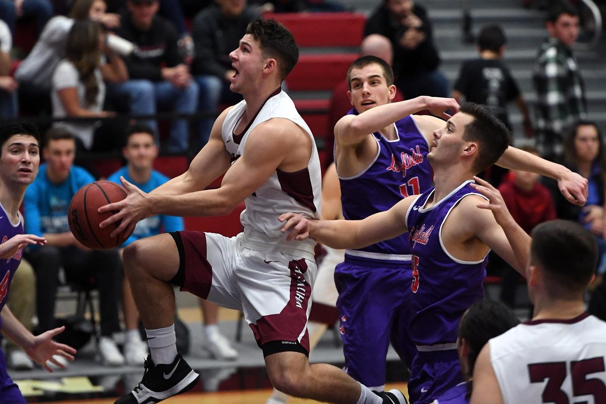 Whitworth guard Ben College (with ball) races to the basket during a college basketball game, Fri., Feb. 8, 2019, at Whitworth University. (Colin Mulvany / The Spokesman-Review)