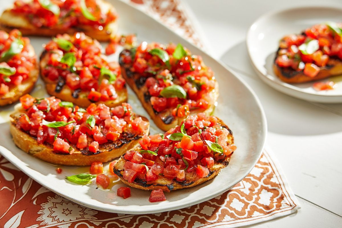 One key to bruschetta is to grill the bread until there are char marks.  (Tom McCorkle/For The Washington Post)