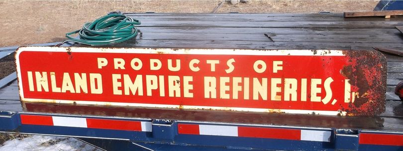 An old gas station sign advertises gasoline refined in Hillyard. 