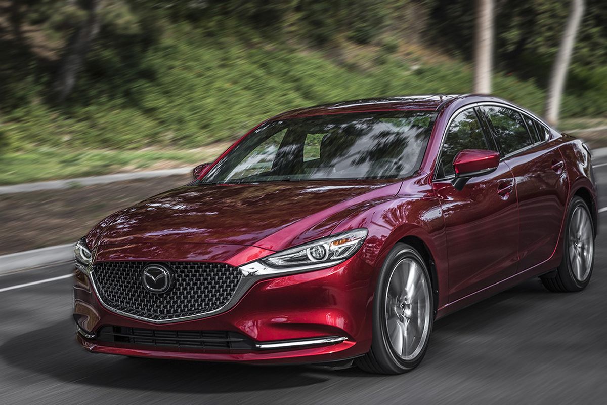 Despite its everyman cost of admission, the midsize four-door exhibits near-luxury levels of comfort and composure.
 (Mazda)