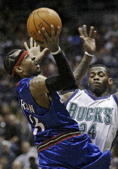 
Philadelphia's Allen Iverson (3) puts up a shot en route to hitting the 15,000-point mark for his career. 
 (Associated Press / The Spokesman-Review)