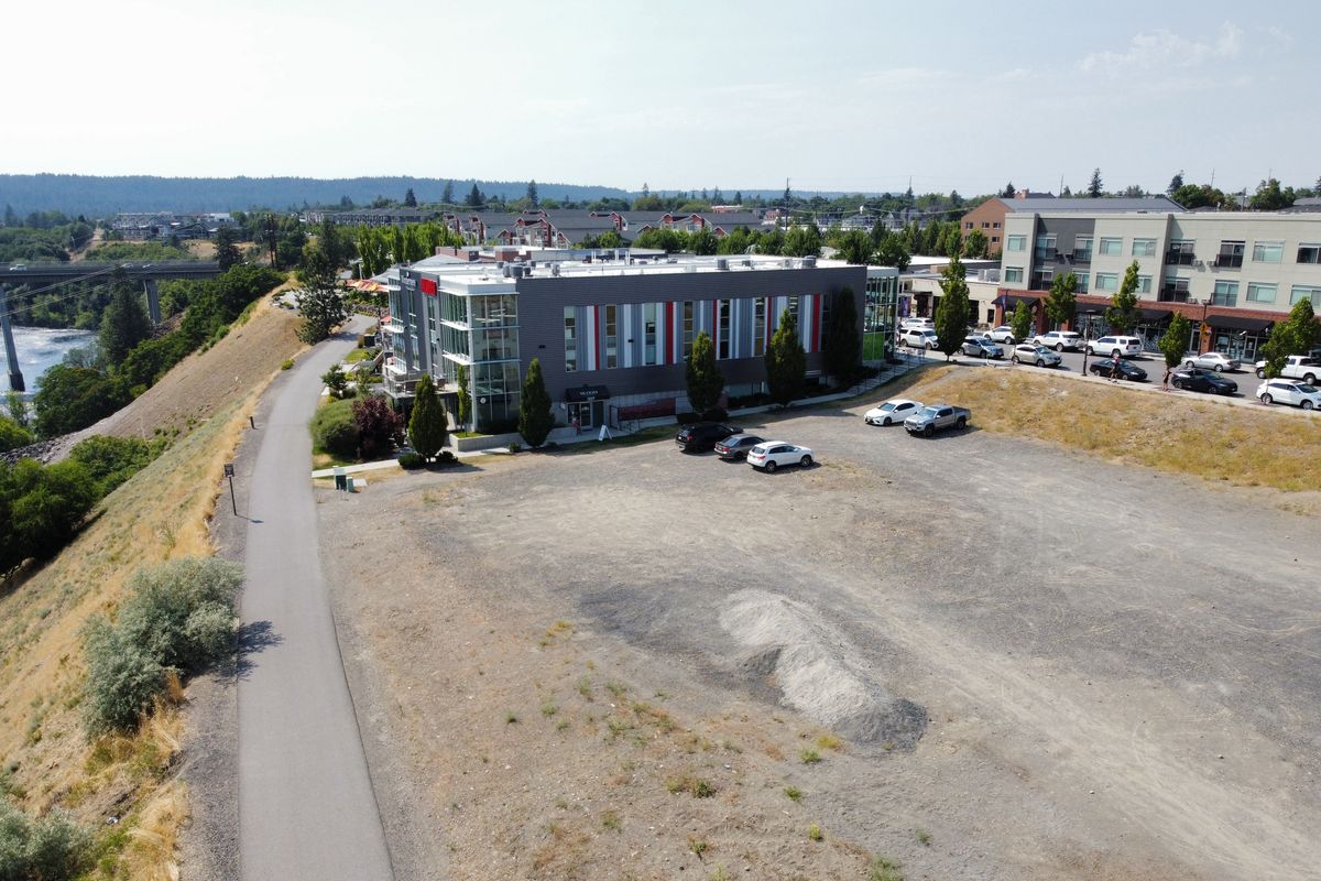 Greenstone is again moving forward on a new six-story multi-use retail/residential building on the empty land east of the Inlander offices in Kendall Yards, shown on July 10, 2024. (Jesse Tinsley/THE SPOKESMAN-REVIEW)