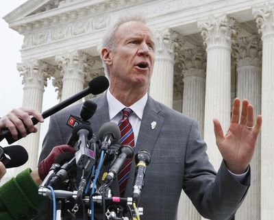 Illinois Governor Bruce Rauner speaks to the media outside the Supreme Court, Feb. 26, 2018 in Washington. (Jacquelyn Martin / Associated Press)