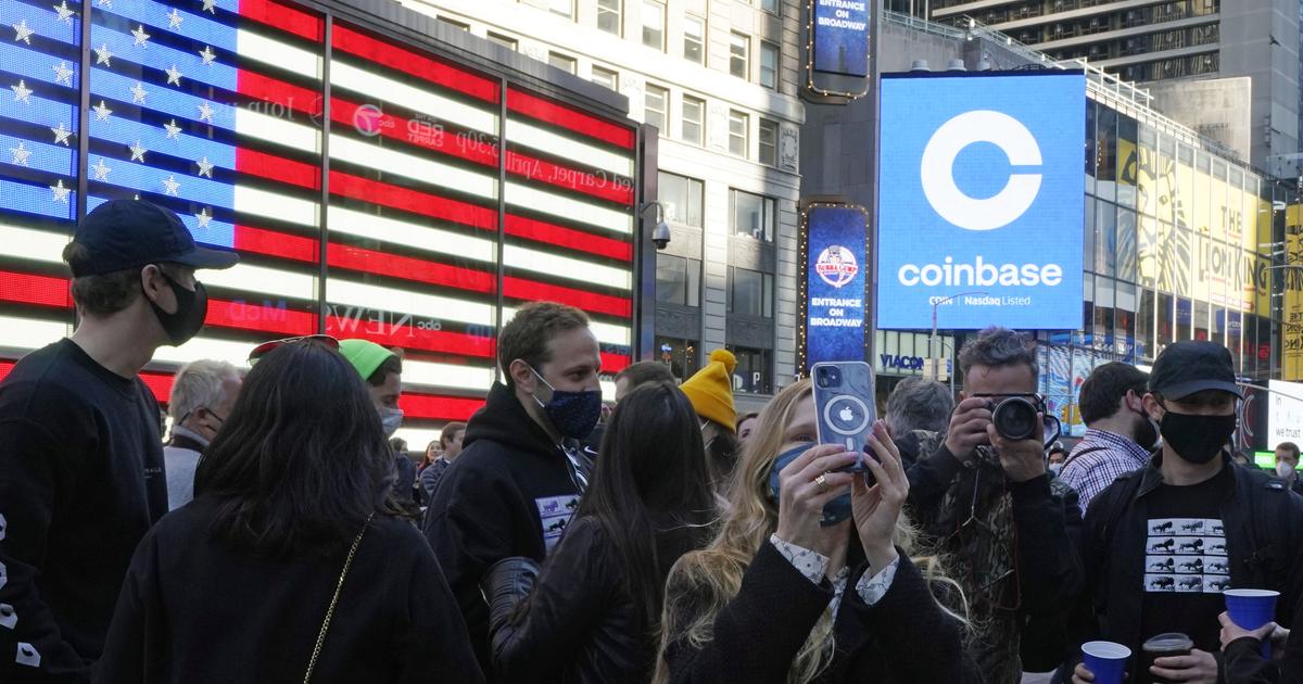 Coinbase soars in market debut, valued near $100 billion | The