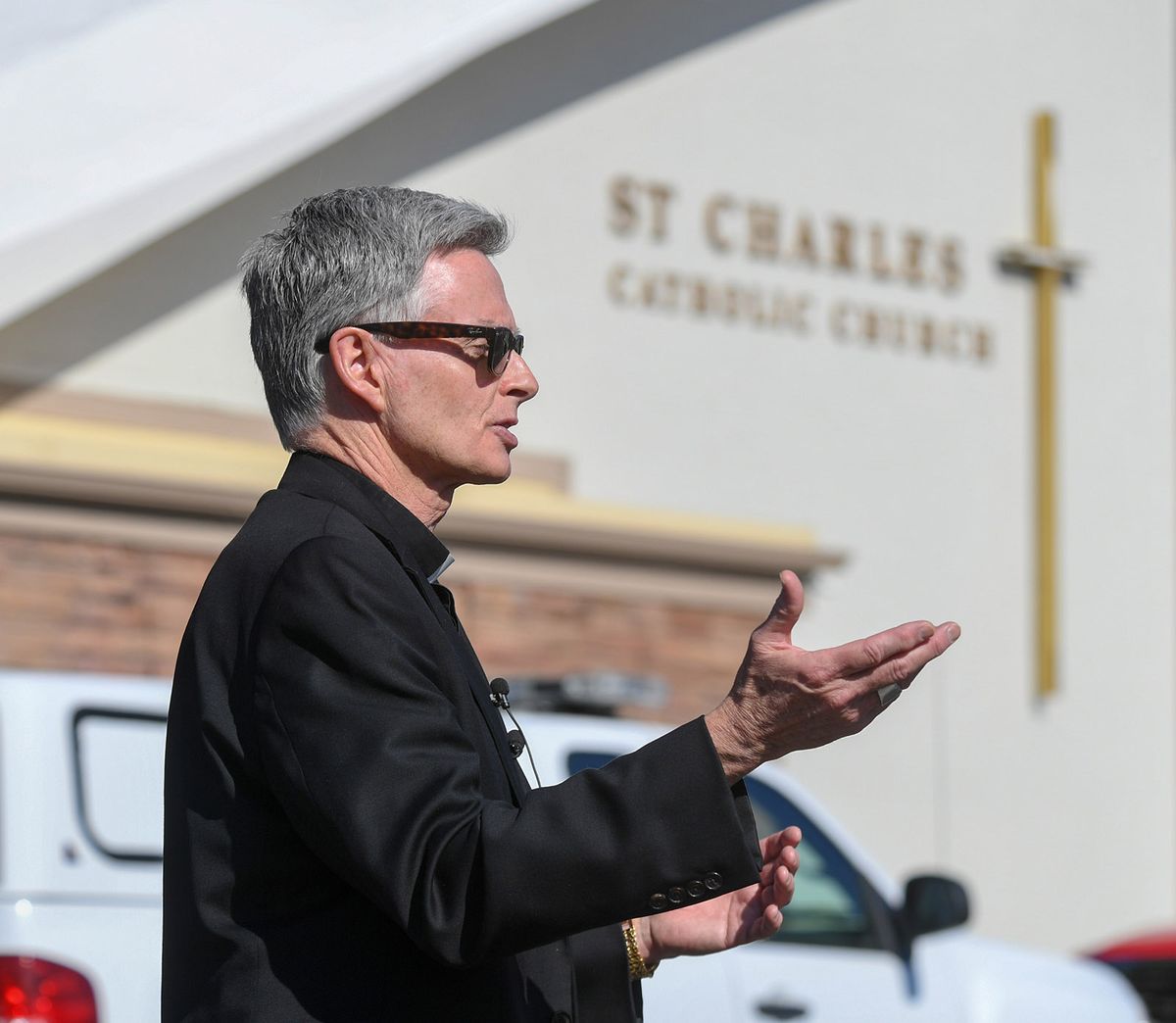 Most Reverend Thomas Daly, Bishop of Spokane, visits St. Charles Catholic School, Thursday, March 18, 2021, after an early morning fire damaged the building.  (DAN PELLE/THE SPOKESMAN-REVIEW)