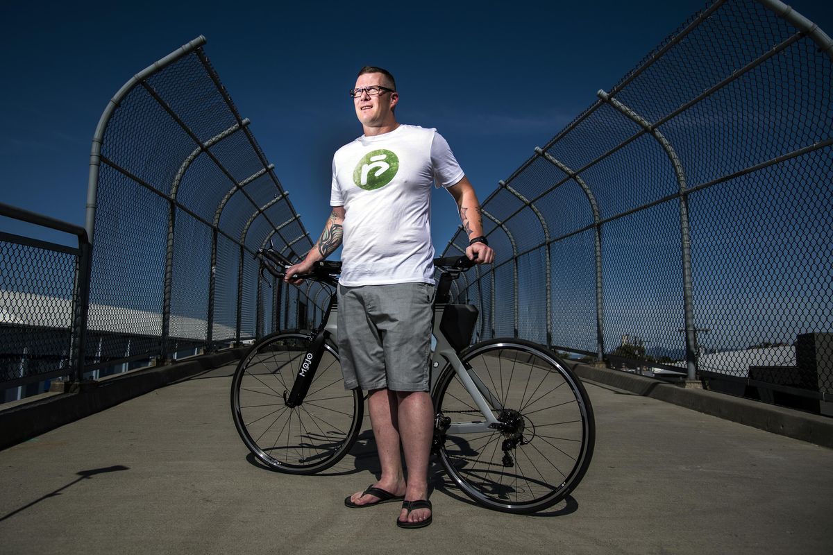 David Neale has overcome many battles in life and shifted his mindset to triathlon and its impact on his mental outlook. (Colin Mulvany / The Spokesman-Review)