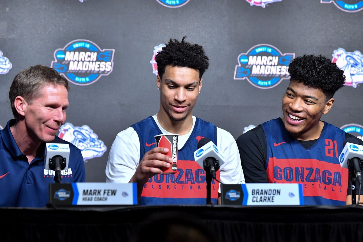 Gonzaga Bulldogs head coach Mark Few smiles with forwards Brandon Clarke (15) and Rui Hachimura (21) during a press conference on Friday, March 29, 2019, at the Honda Center in Anaheim, Calif. The Zags will face Texas Tech in the NCAA men
