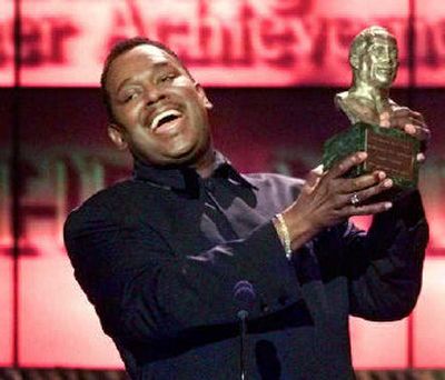 
Luther Vandross accepts the Quincy Jones Award for Outstanding Career Achievements at the 13th annual Soul Train Music Awards in 1999. 
 (File/Associated Press / The Spokesman-Review)
