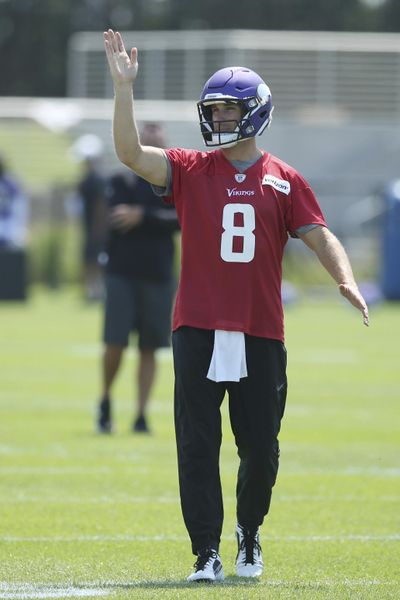 Minnesota Vikings quarterback Kirk Cousins takes part during the NFL football team's training camp which opened with rookies and select veterans Tuesday July 23, 2019, in Eagan, Minn. (Jim Mone / Associated Press)