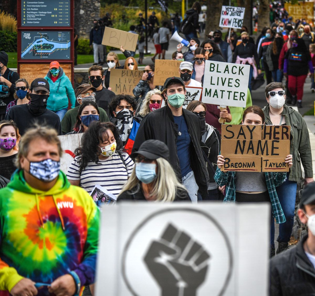 Hundreds of people gather to march through Riverfront Park on Saturday as part of the Occupy Spokane nonviolent protest for Breonna Taylor.  (DAN PELLE/THE SPOKESMAN-REVIEW)