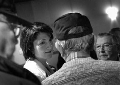 
 Rep. Cathy McMorris Rodgers chats with a group after a town hall meeting at CenterPlace in Spokane Valley on  Tuesday. 
 (Jed Conklin / The Spokesman-Review)