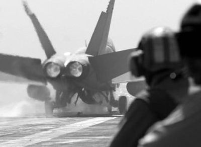 
A fighter jet takes off from the USS Nimitz  in the Persian Gulf on Tuesday. Airstrikes in support of U.S. and coalition forces in Iraq and Afghanistan are among duties of the carrier-based jets.
 (Associated Press / The Spokesman-Review)