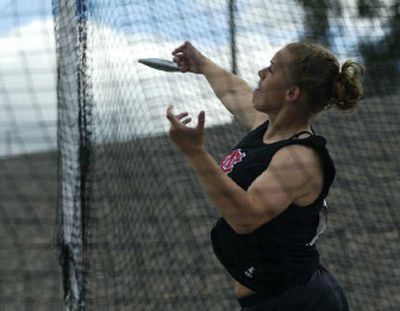 
North Central senior Ashlee Michelson, Friday's winner in the shot put, uncorks a throw Saturday on the way to winning the State 3A discus at 132-10. 
 (Molly Van Wagner Special to / The Spokesman-Review)