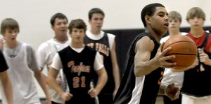 Shawn Reid is shown during basketball practice at Post Falls High School on Nov. 25. (Kathy Plonka / The Spokesman-Review)
