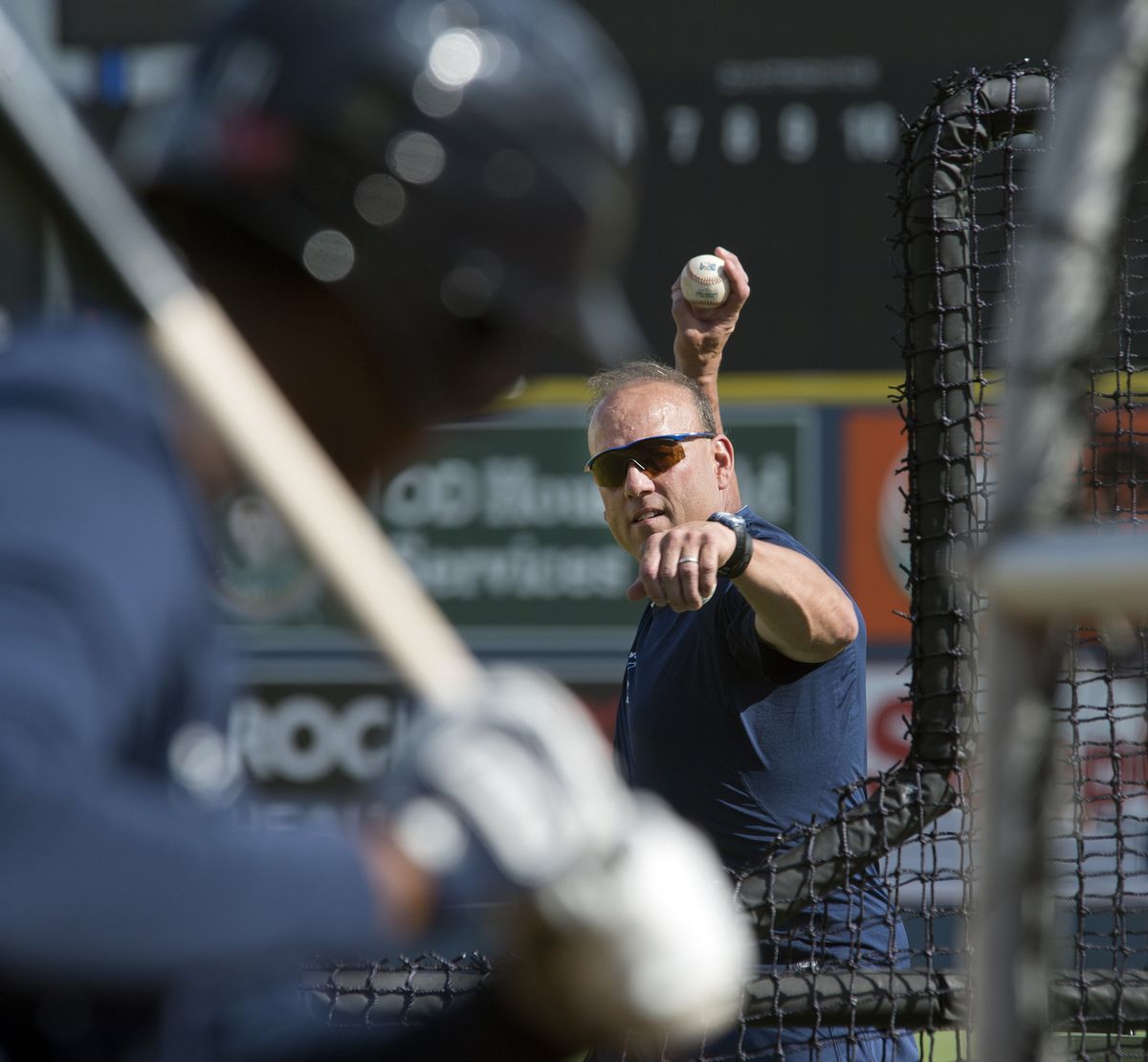 Dave Valle throws batting practice before Saturday night’s game. (Dan Pelle)