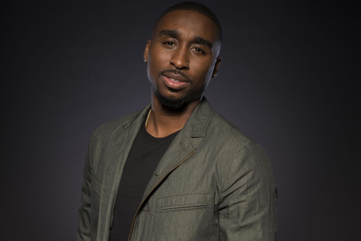 In this June 5, 2017 photo, Demetrius Shipp Jr. poses for a portrait at the "All Eyez on Me" junket at the Four Seasons Hotel in Beverly Hills, Calif. Shipp portrays the late rapper Tupac Shakur, who was killed in 1996. (Ron Eshel / Ron Eshel/Invision/AP)