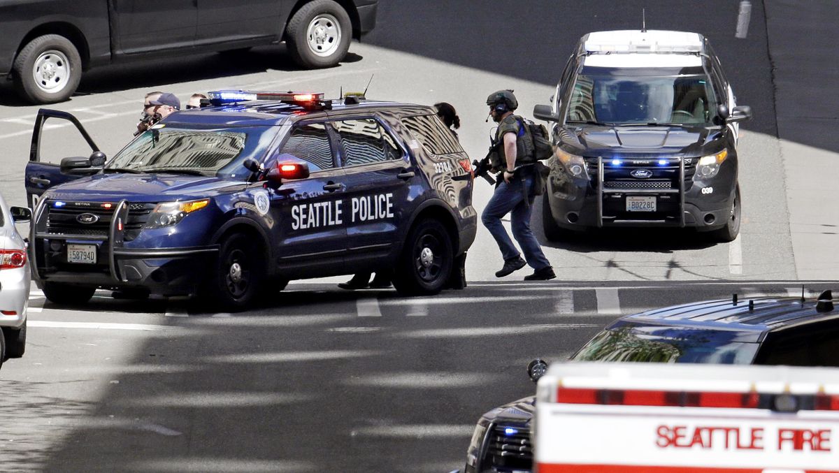 A Seattle police vehicle. Seattle police say a female suspect is dead following a shooting involving police Sunday morning. (Elaine Thompson / AP)