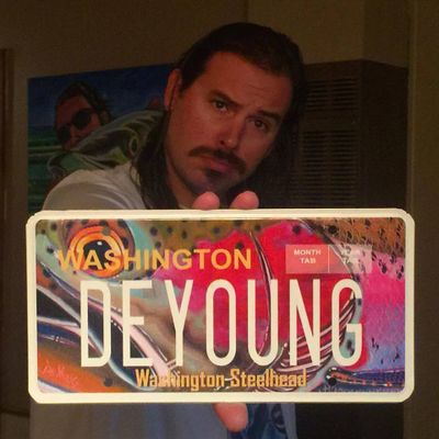  Artist and avid angler Derek DeYoung designed Washington's steelhead vehicle license plate, which benefits steelhead conservation programs. (Washington Department of Fish and Wildlife)
